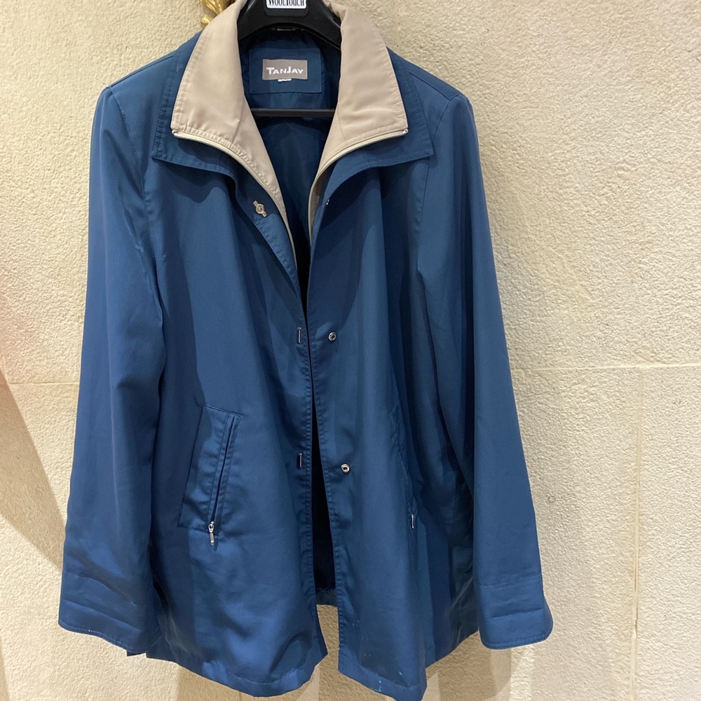 Blue rain coat.